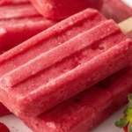 Homemade strawberry ice cream bars with fresh strawberries